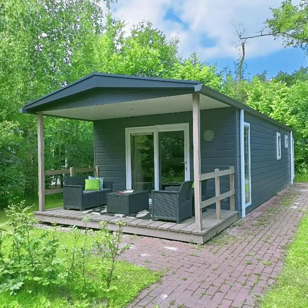 4p chalet TOLVE met 4 fietsen vlakbij natuurgebieden Drents Friese Wold, Fochteloërveen en gevangenisdorp Veenhuizen，位于奥斯特沃尔德的酒店