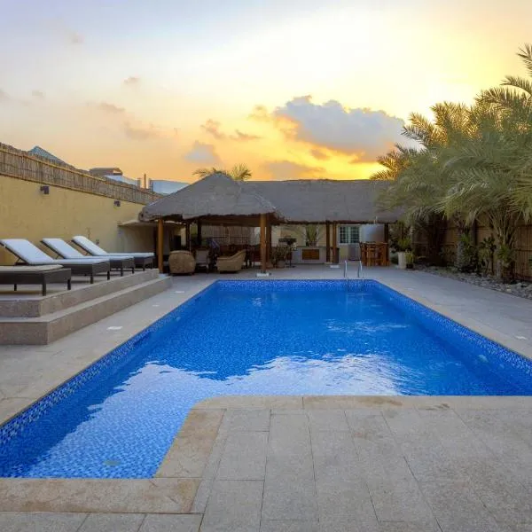 Dar 66 Pool Villa with Jacuzzi，位于Jazirat al Hamra'的酒店