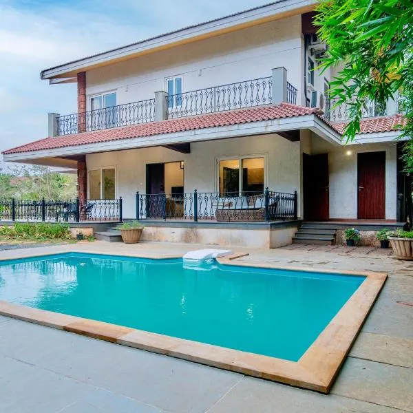 SaffronStays Boulevard StoneHouse - pool villa with mountain views，位于Khamshet的酒店