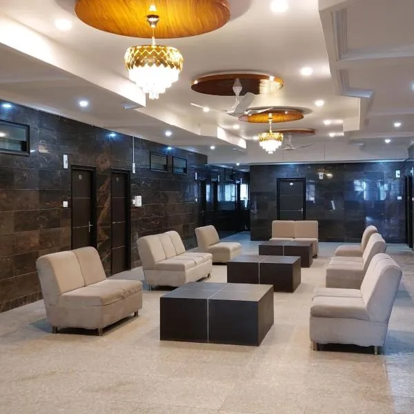 STAYMAKER Siddeshwara Comforts，位于达文盖雷的酒店