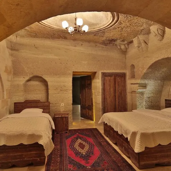家庭洞穴套房酒店，位于Bozca的酒店