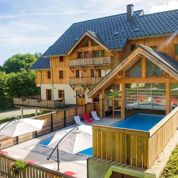 Appartement Les Chalets de Belledonne，位于Saint-Colomban-des-Villards的酒店