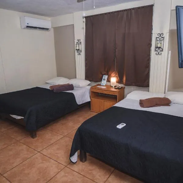 Departamento CENTRICO, Tv smart, minisplit nuevo, wifi 100 mb, cocina, lavadora, asador, parking, letra i，位于巴耶斯城的酒店