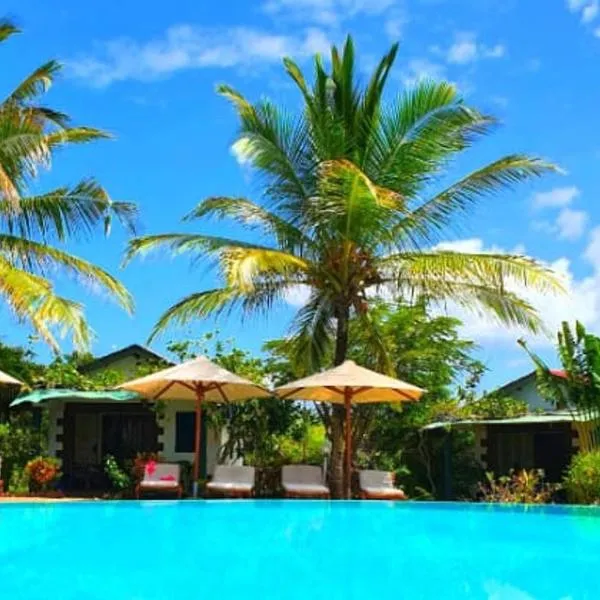 迪亚尼海滩非洲梦别墅酒店，位于Tiwi的酒店