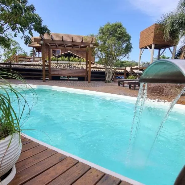 Arte da Tribo Hostel & Camping，位于普腊亚罗萨的酒店