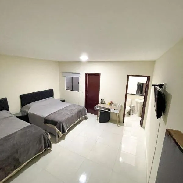 España Suites Hotel,位于埃斯特城的酒店