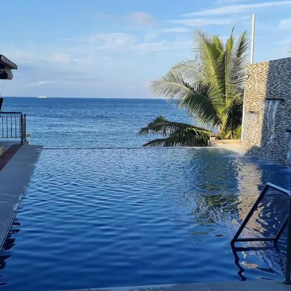 Beachfront Vacation Villa with Infinity Pool，位于De la Paz的酒店