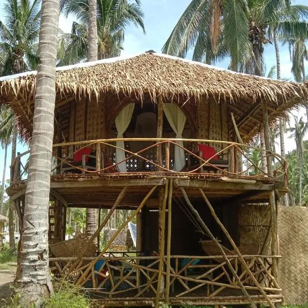 Prince John beachfront cottages and Restaurant，位于Komdong的酒店