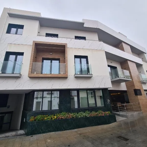 OIKOS APARTAMENTOS TURÍSTICOS，位于El Real de la Jara的酒店