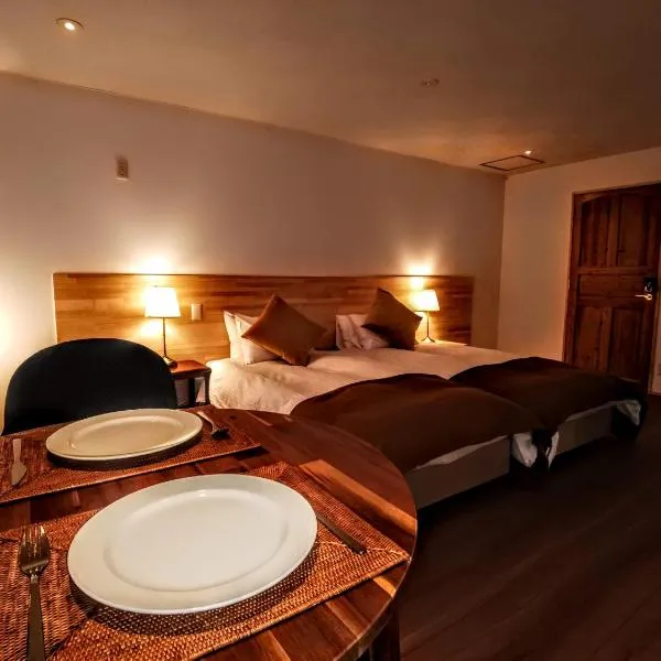 Fujio Pension Madarao Apartment Hotel & Restaurant，位于饭山市的酒店