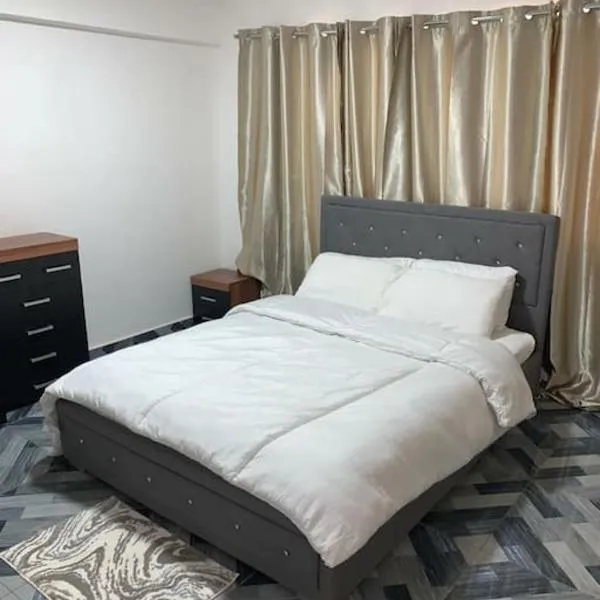 Lovely 1-bedroom rental unit for short stays.，位于Dawhwenya的酒店