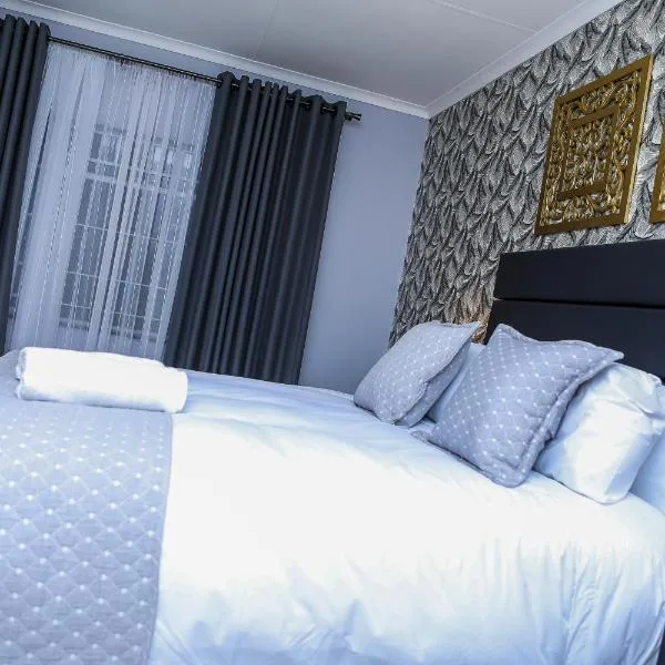 Delux Guesthouse,位于Volksrust的酒店