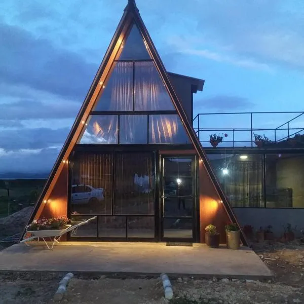 Glamping y Cabañas el Encanto-Girasoles，位于托塔的酒店