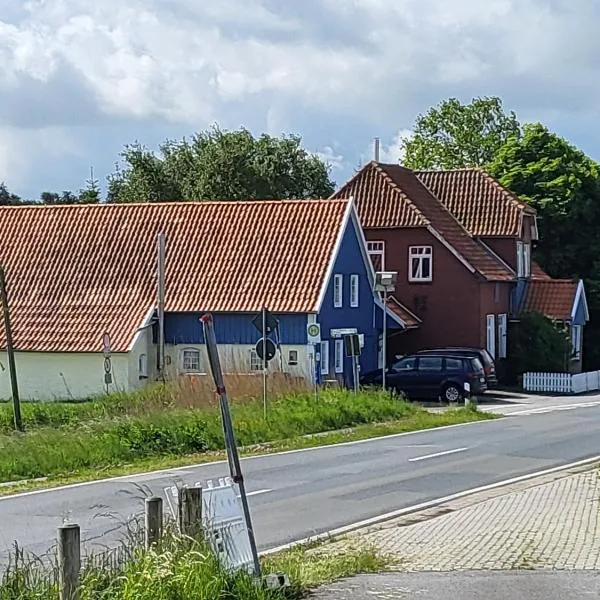 Urlaub im blauen Haus，位于Süderschweiburg的酒店