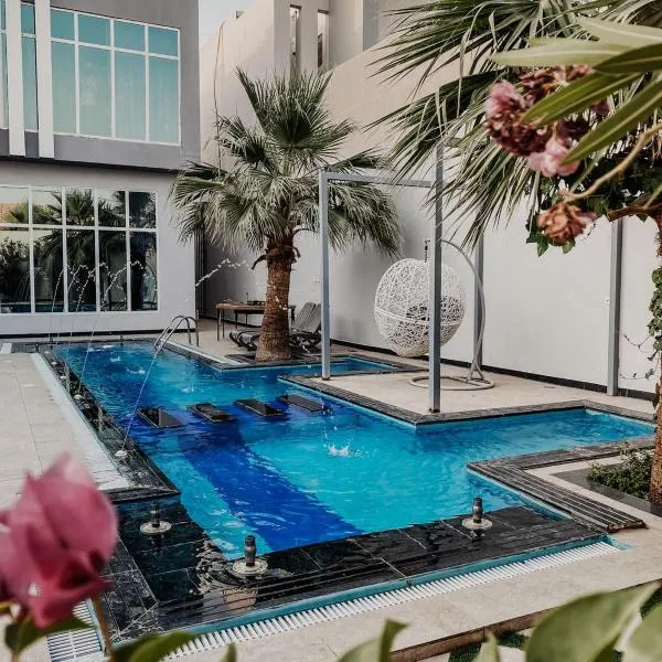 شاليه بالم ون الفندقي，位于Al Başar的酒店