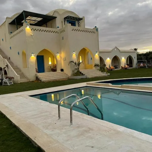 Lake House by Tunisia Green Resort，位于Qaryat at Ta‘mīr as Siyāḩīyah的酒店