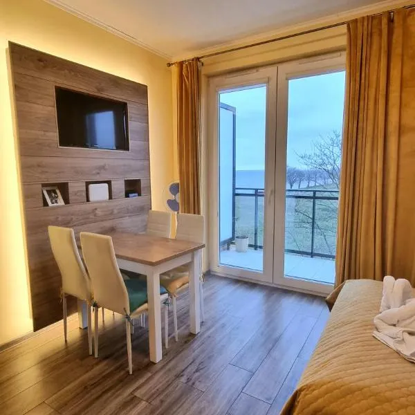 Apartament "Złoty relaks" tuż przy plaży z balkonem z widokiem na Hel i hamakami，位于帕克的酒店