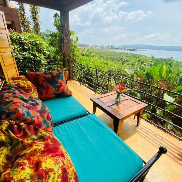 Home On The Nile water front Cottage，位于金贾的酒店