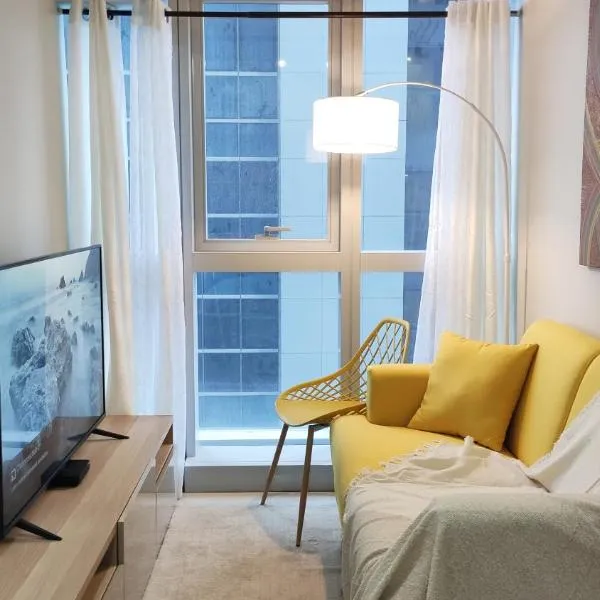 Uptown Parksuites BGC 2 bedroom 2 bath，位于马尼拉的酒店