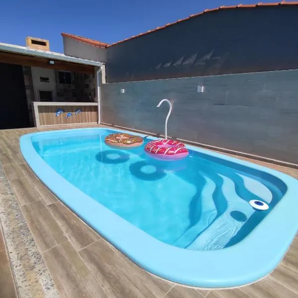 Casa de Praia com Piscina por Temporada Orla 500 Unamar Cabo Frio RJ，位于Angelim的酒店