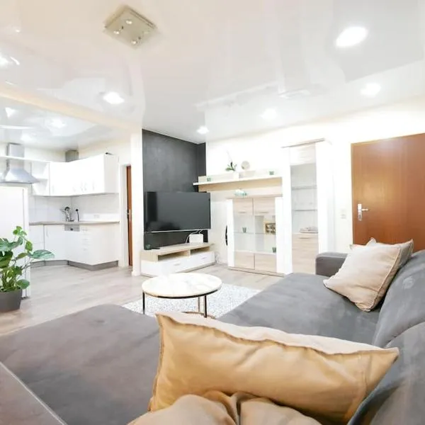 61 m2 Erdgeschosswohnung mit eigenem Parkplatz vorm Haus，位于奥斯纳布吕克的酒店