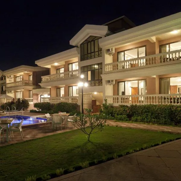 De Mandarin Beach Resort Suites & Villas, Candolim，位于坎多林的酒店