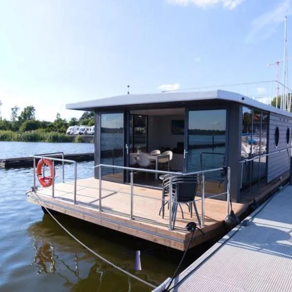 Hausboot Fjord Aries mit Dachterrasse in Schleswig，位于石勒苏益格的酒店
