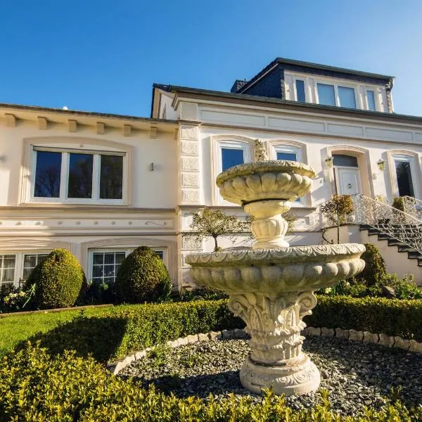 Villa Rosengarten auf der Sonneninsel Fehmarn，位于费马恩的酒店