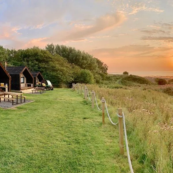 St Aidan Beach Hut Alnmouth，位于阿尔恩茅斯的酒店