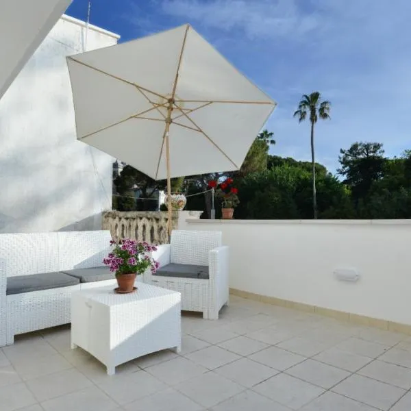 Casa Flò - con VISTA sul PARCO，位于奥斯图尼的酒店