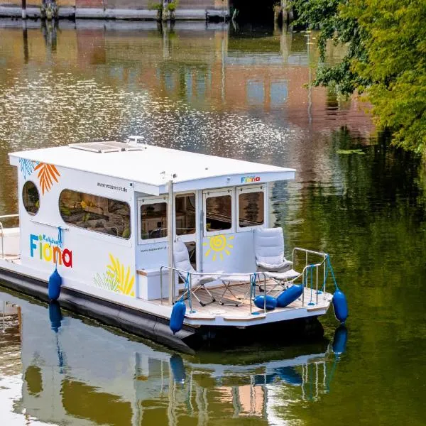 Hausboot FIONA im Yachthafen Berlin-Schmöckwitz auf der Spree und dem Müggelsee von Anfang April bis Ende Oktober，位于柏林的酒店