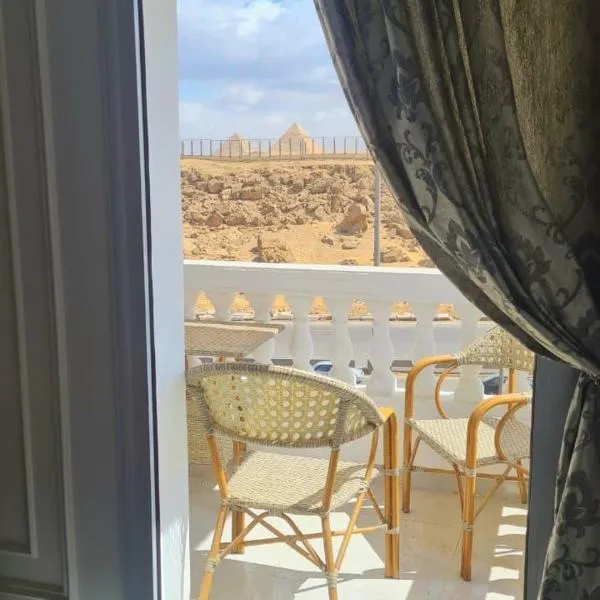 Pyramids View Apartment，位于Giza的酒店