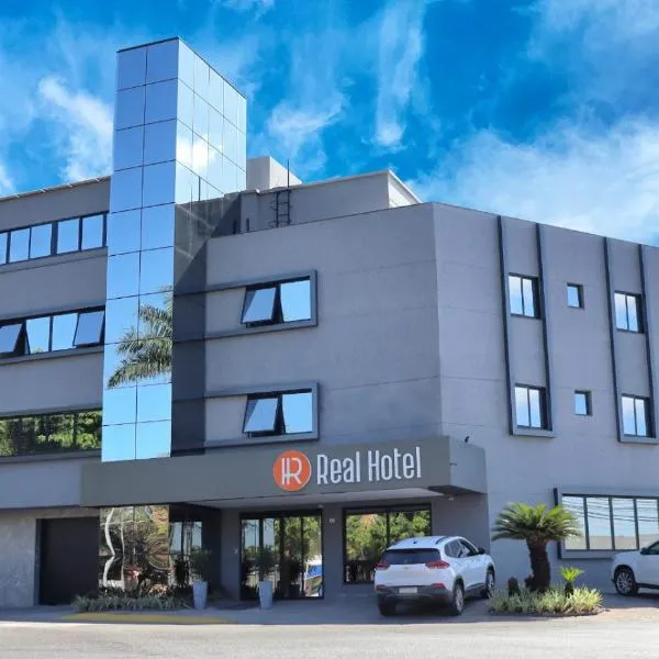 Real Hotel，位于Capim Branco的酒店