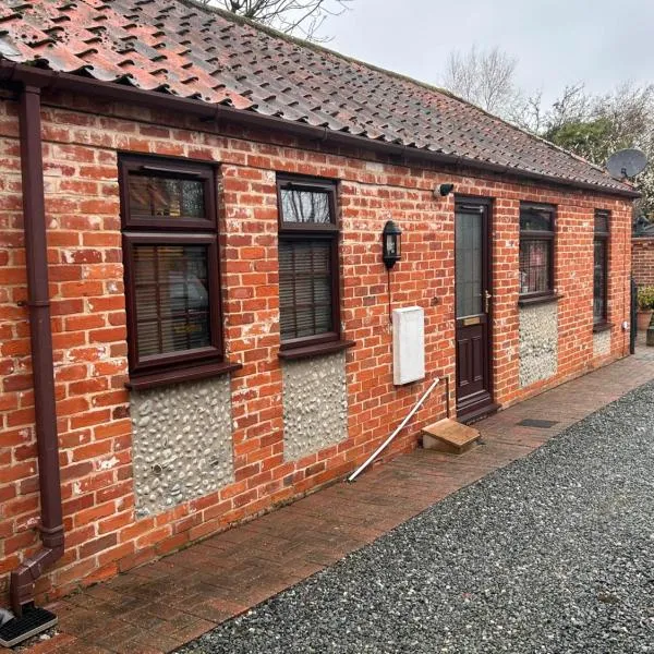 The Old Stables in Mews，位于Reydon的酒店