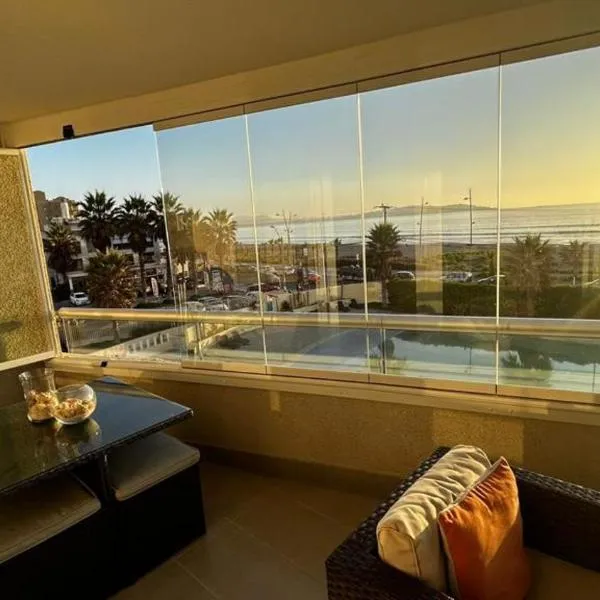 DPTO- CALOR DE HOGAR AVDA DEL MAR- AQUA LA SERENA PRIMERA LINEA，位于拉塞雷纳的酒店