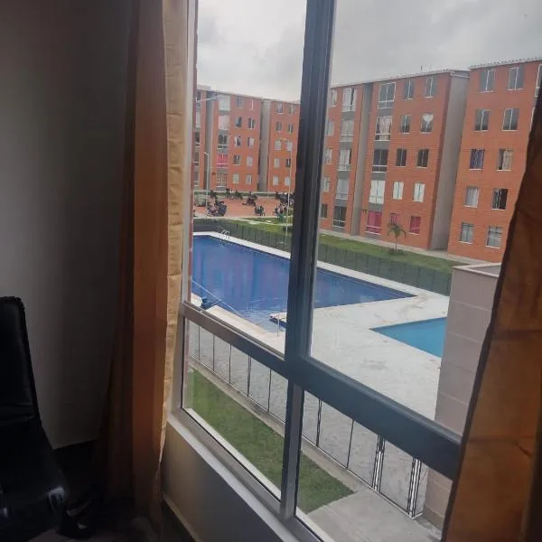 Apartamento con parqueadero y piscina，位于Arrayanal的酒店
