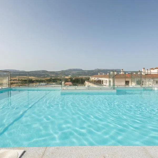 Apartamentos Martalia Áticos Deluxe，位于隆达的酒店