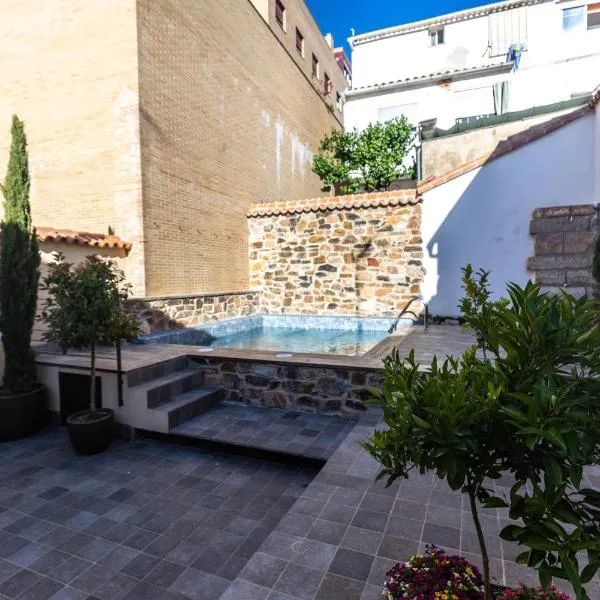 Apartamentos Turísticos DE LA BERNARDA，位于卡塞雷斯的酒店