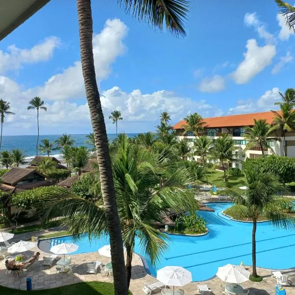 Estúdio equipado Marulhos com varanda, vista de mar e parque aquático, à beira-mar mar de Muro Alto, com wi-fi, restaurante, estacionamento e a 10' de Porto de Galinhas，位于嘎林海斯港的酒店