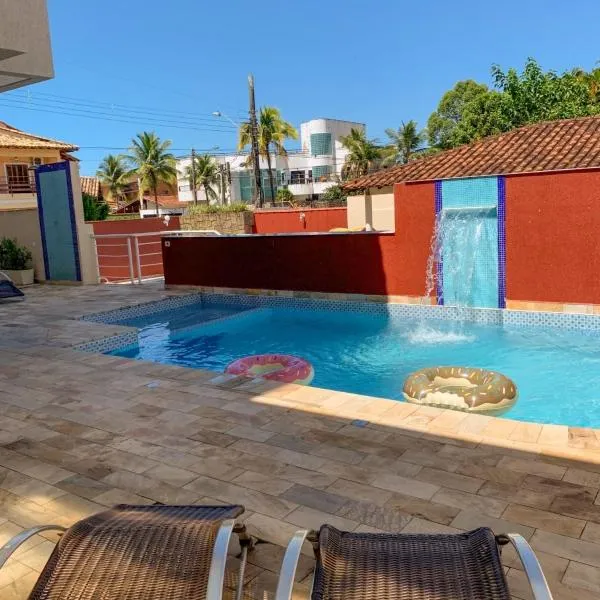 Hotel Rosa da Ilha - Pertinho do Mar com piscina，位于瓜鲁雅的酒店