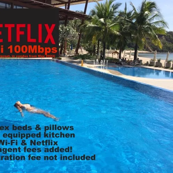 Beach condos at Pico de Loro Cove - Wi-Fi & Netflix, 42-50''TVs with Cignal cable, Uratex beds & pillows, equipped kitchen, balcony, parking - guest registration fee is not included，位于Papaya的酒店