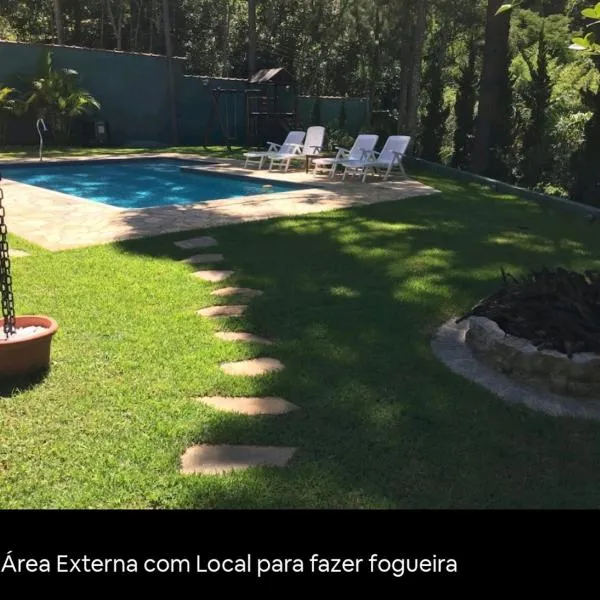 Chacara com Piscina Aquecida，位于瓜鲁柳斯的酒店