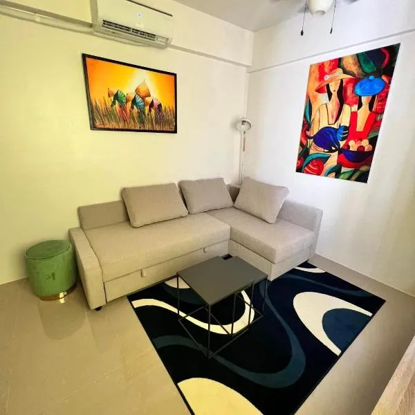 Cozy almond drive condo in cebu，位于塔里萨伊的酒店