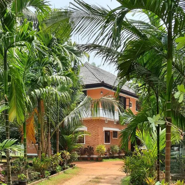 Joan's Homestay Near Kumarakom，位于Vaikom的酒店