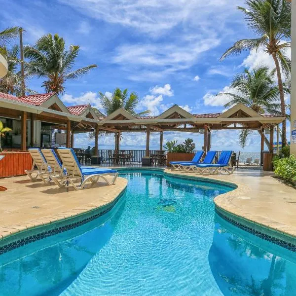 阳光煦风套房酒店，位于Ambergris Cay的酒店