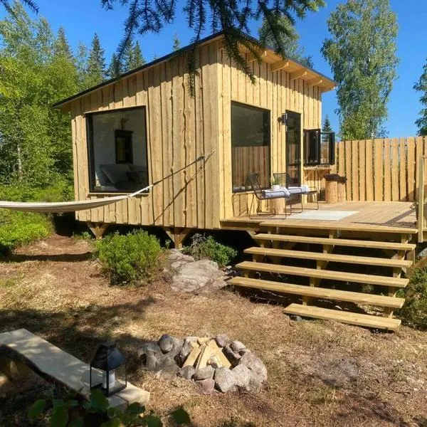 Forest cabin with stunning mountain view & Sauna，位于Långav的酒店