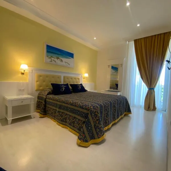 Falli Exclusive Rooms and Breakfast -con Parcheggio Privato e Gratuito-，位于切萨雷奥港的酒店
