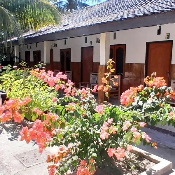 Ekas beach guesthouse and restaurant，位于Sunut的酒店