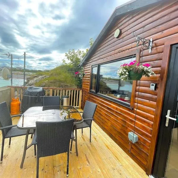 Cosy Portmor Log Cabin，位于Malin Head的酒店