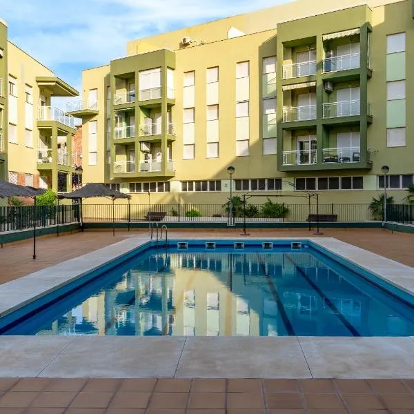 Bonito apartamento en la playa con piscina y parking，位于托雷努埃瓦的酒店